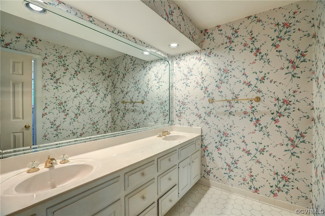 505 St Albans Way Henrico, VA 23229 - Photo 22 of 36 a bathroom with a sink and a mirror