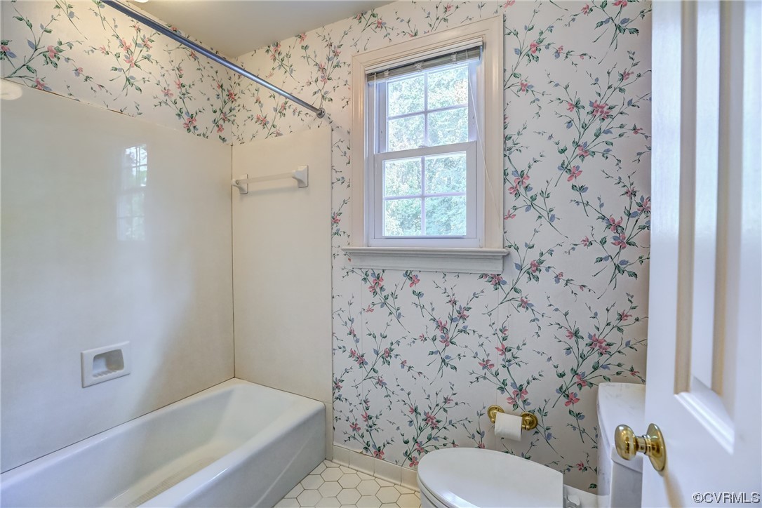 505 St Albans Way Henrico, VA 23229 - Photo 23 of 36 a bathroom with a toilet and a shower curtain