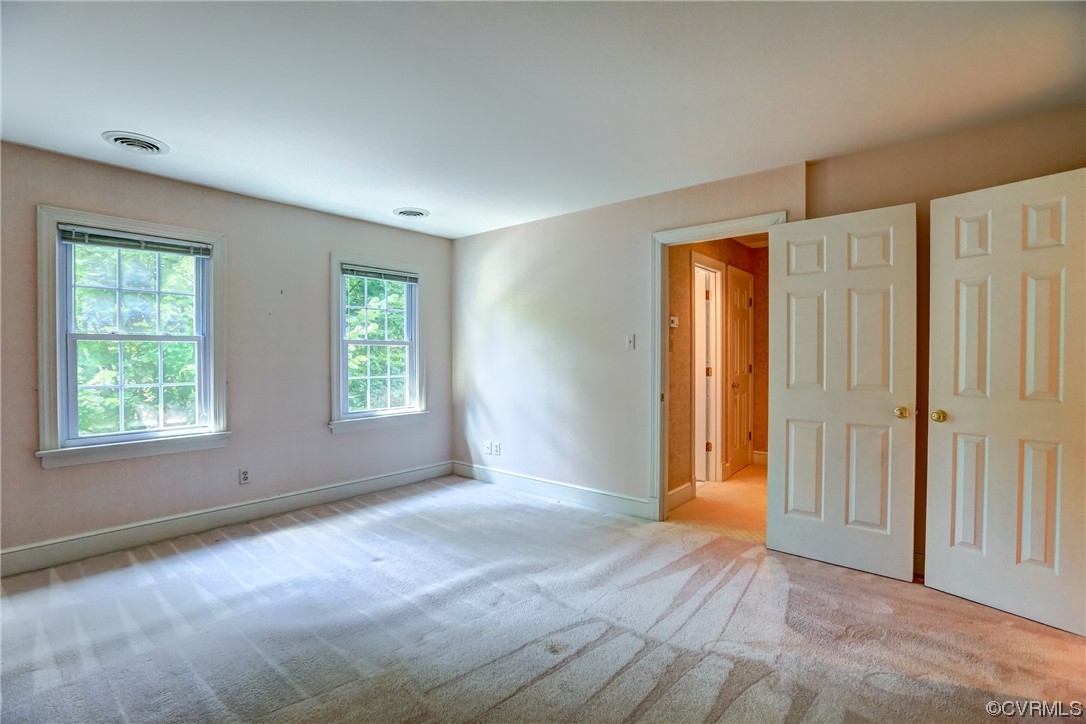505 St Albans Way Henrico, VA 23229 - Photo 24 of 36 an empty room with windows and closet