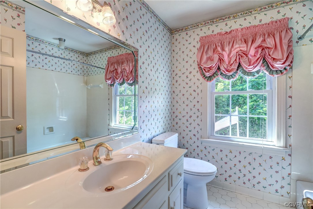505 St Albans Way Henrico, VA 23229 - Photo 25 of 36 a bathroom with a sink and a mirror
