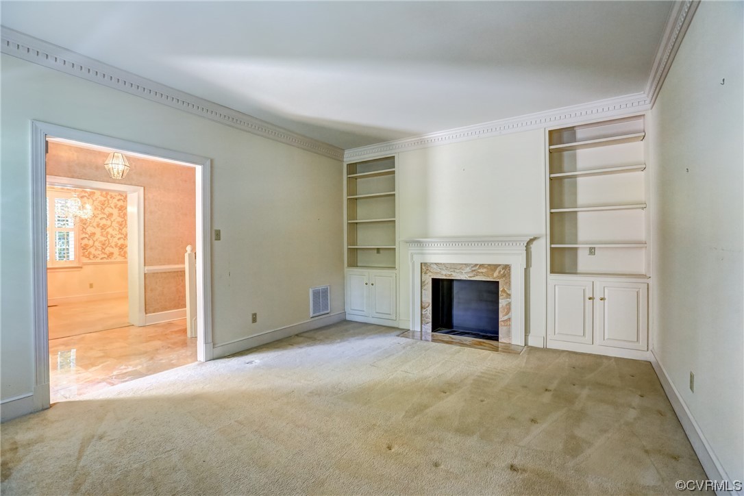 505 St Albans Way Henrico, VA 23229 - Photo 10 of 36 an empty room with a fireplace and window