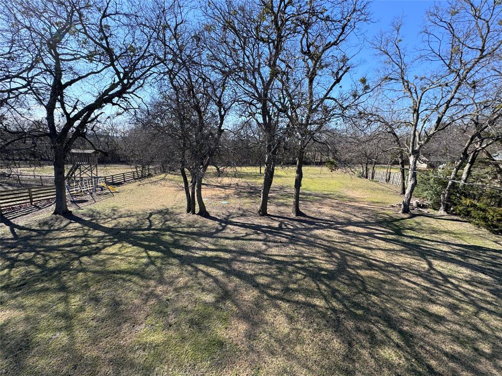2202 Carriage Estates Road Sherman, TX 75092 - Photo 18 of 18 a view of road and trees