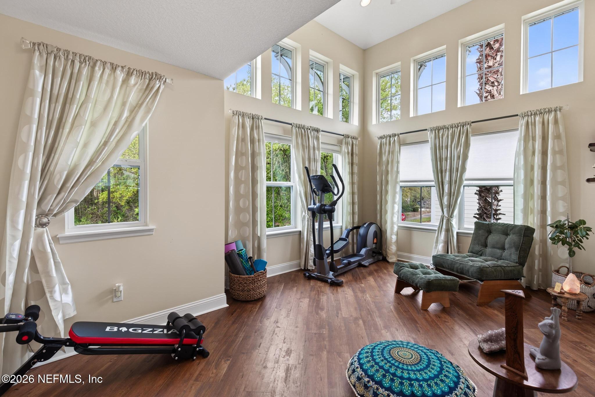 1906 North Loop Parkway St. Augustine, FL 32095 - Photo 11 of 87 a living room with furniture and a large window
