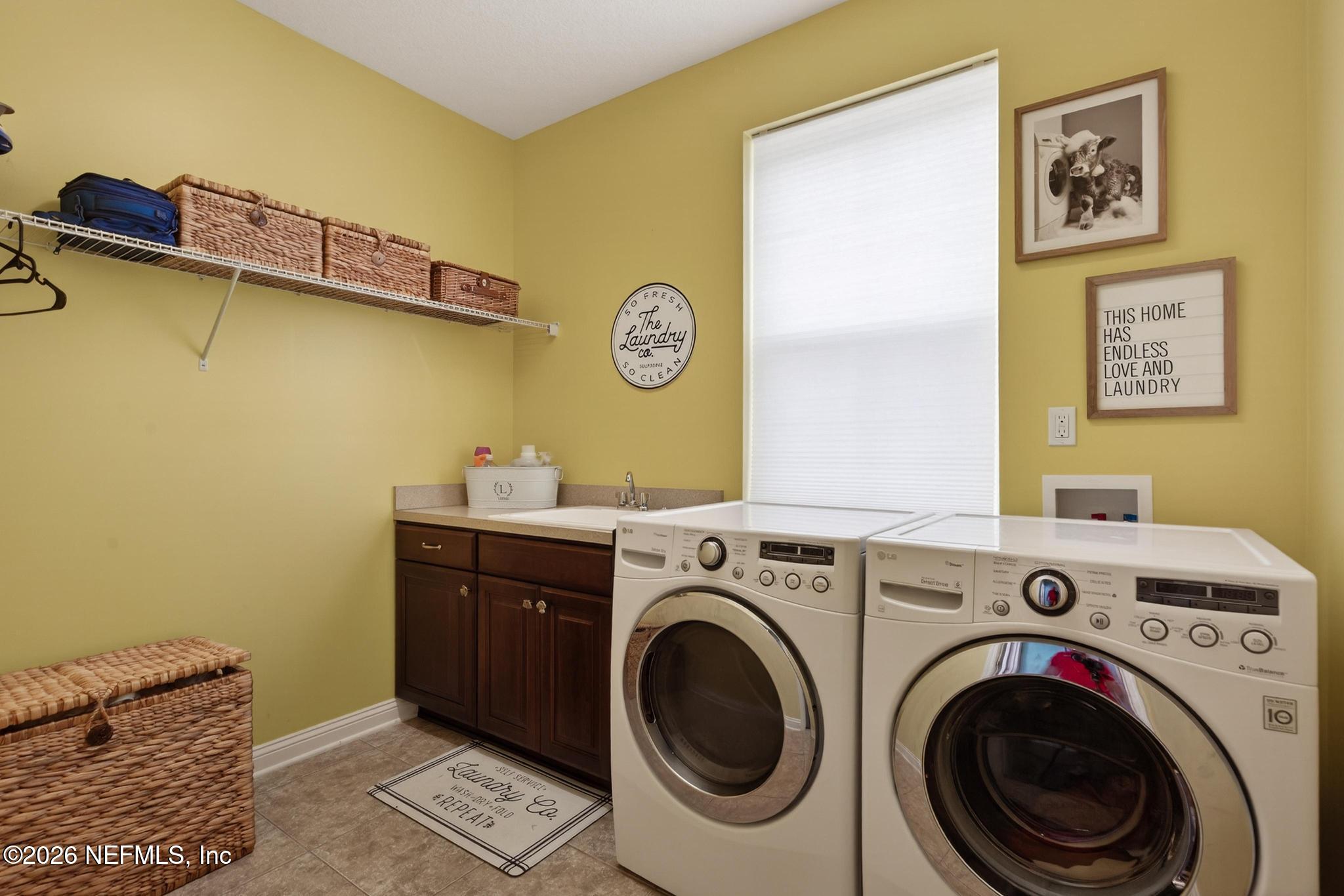 1906 North Loop Parkway St. Augustine, FL 32095 - Photo 24 of 87 a view of a storage & utility room with a washer dryer