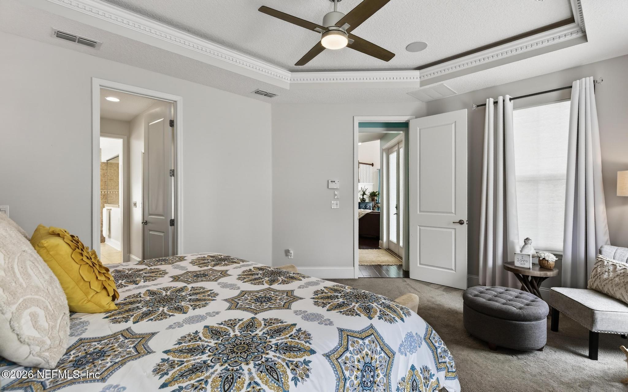 1906 North Loop Parkway St. Augustine, FL 32095 - Photo 43 of 87 a bedroom with a bed and wooden floor
