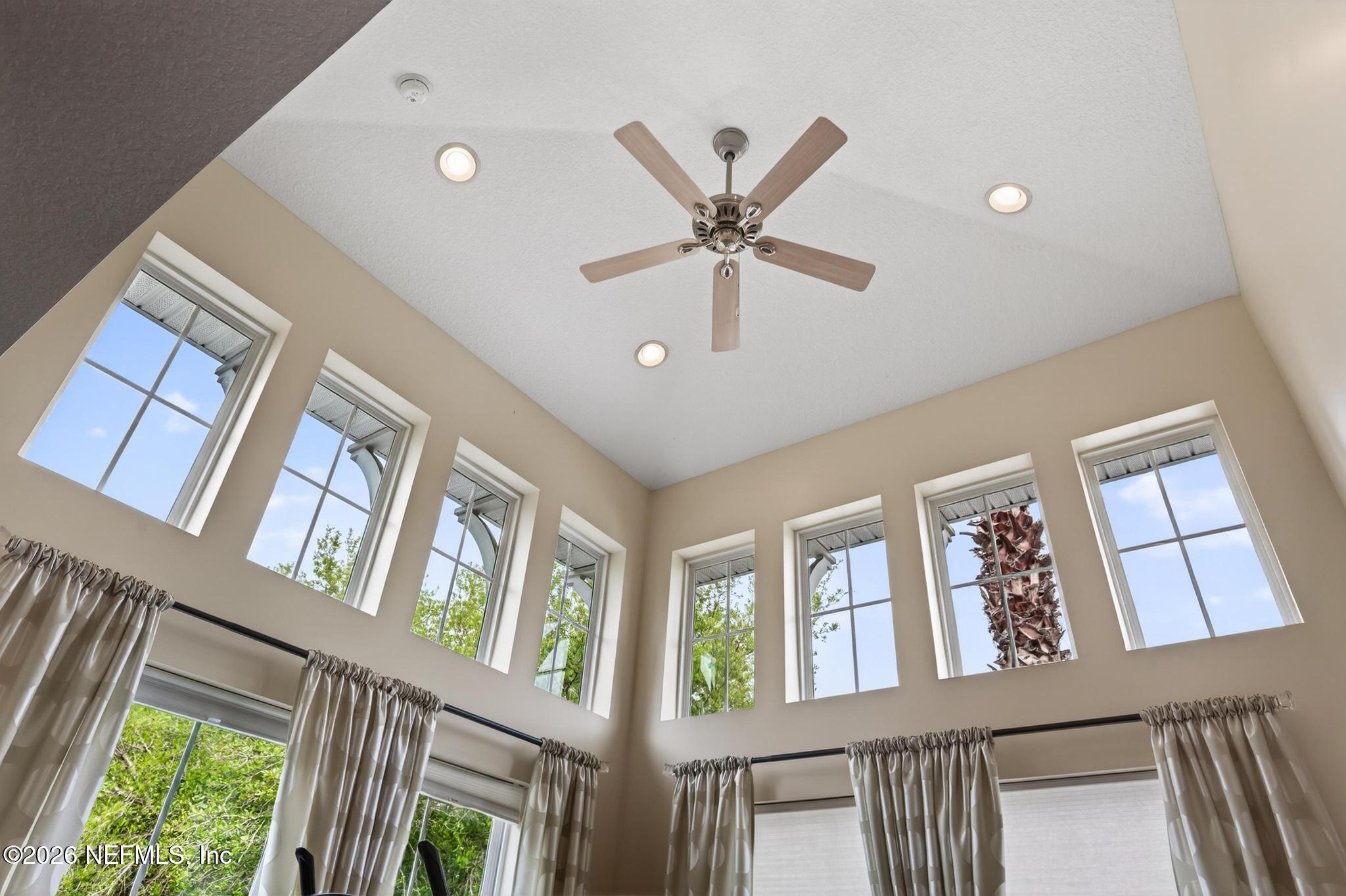 1906 North Loop Parkway St. Augustine, FL 32095 - Photo 6 of 87 a view of a livingroom with a ceiling fan and window
