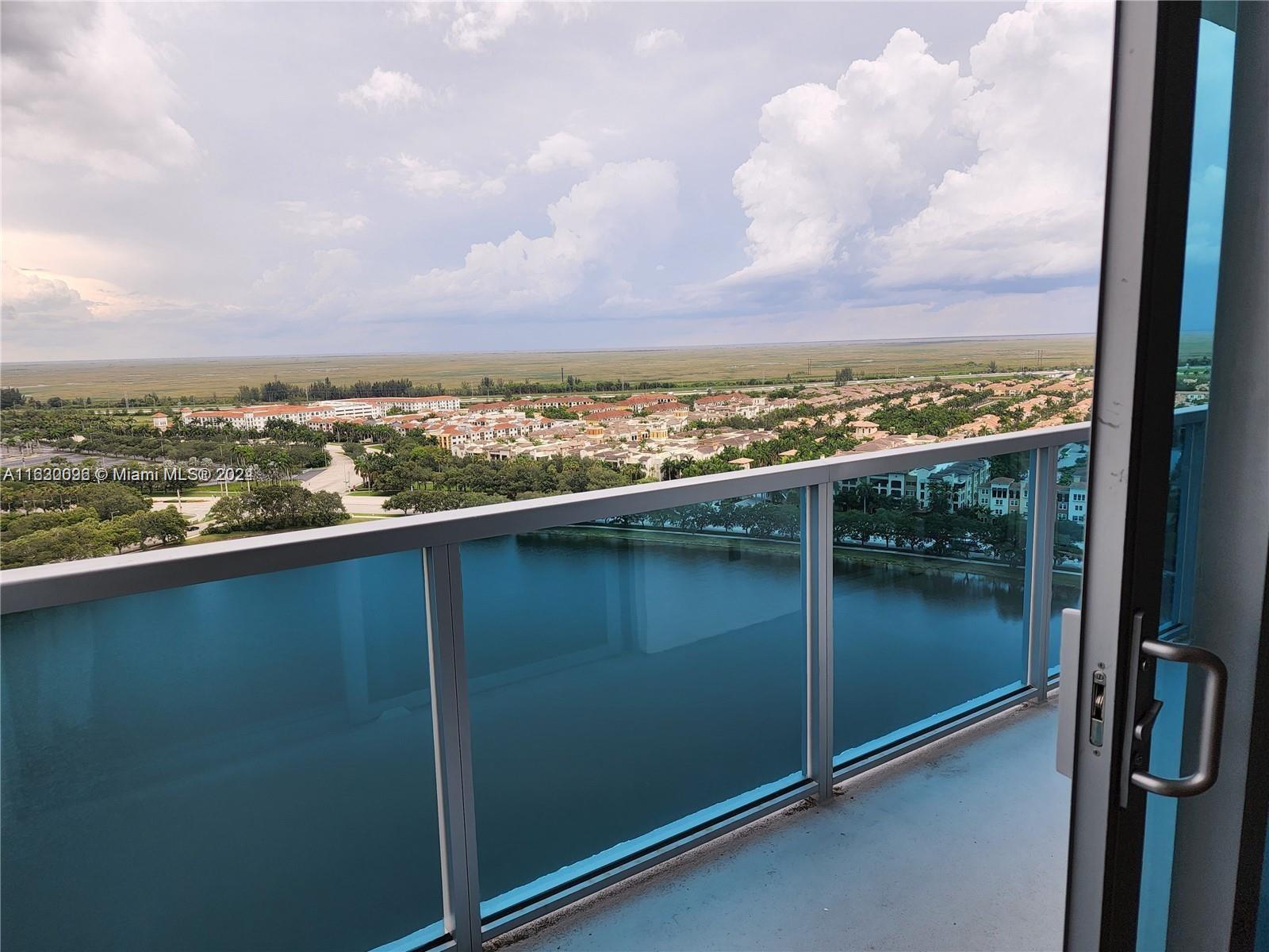 2641 North Flamingo Road, Unit 2007N Sunrise, FL 33323 - Photo 15 of 18 a view of a lake from a balcony