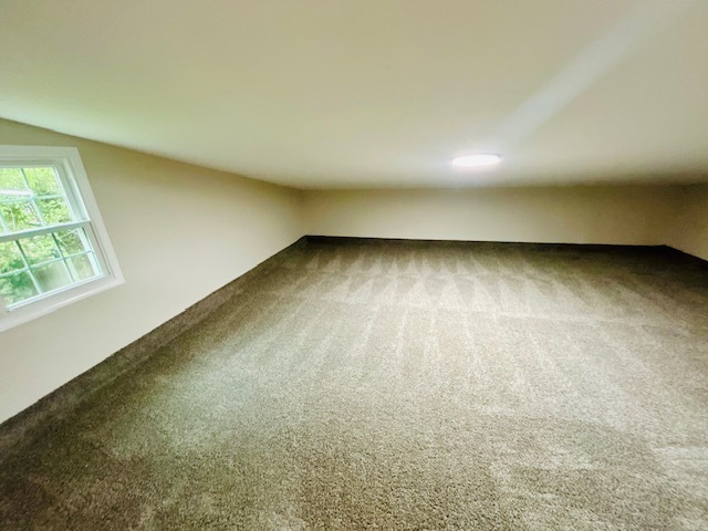 200 South Delaplaine Road Riverside, IL 60546 - Photo 19 of 21 an empty room with wooden floor and windows