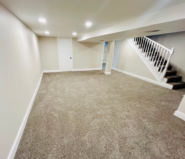 200 South Delaplaine Road Riverside, IL 60546 - Photo 21 of 21 an empty room with staircase and white walls
