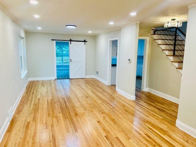 200 South Delaplaine Road Riverside, IL 60546 - Photo 7 of 21 a view of a room with wooden floor and natural light