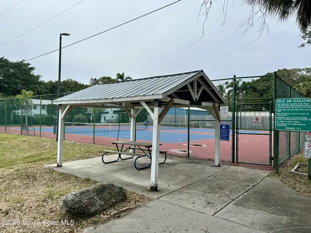 a view of a park with swings