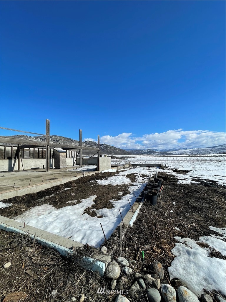 179 Tonasket Airport Road Tonasket, WA 98855 - Photo 21 of 31 a view of a ocean with beach