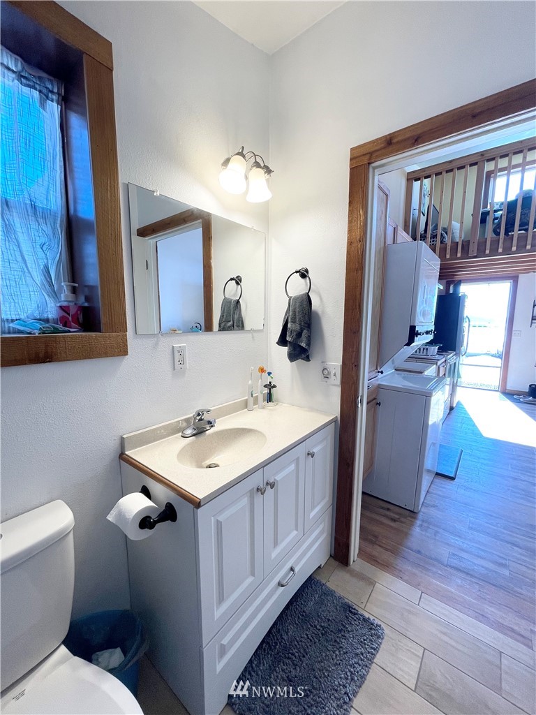 179 Tonasket Airport Road Tonasket, WA 98855 - Photo 8 of 31 a bathroom with a sink and a mirror