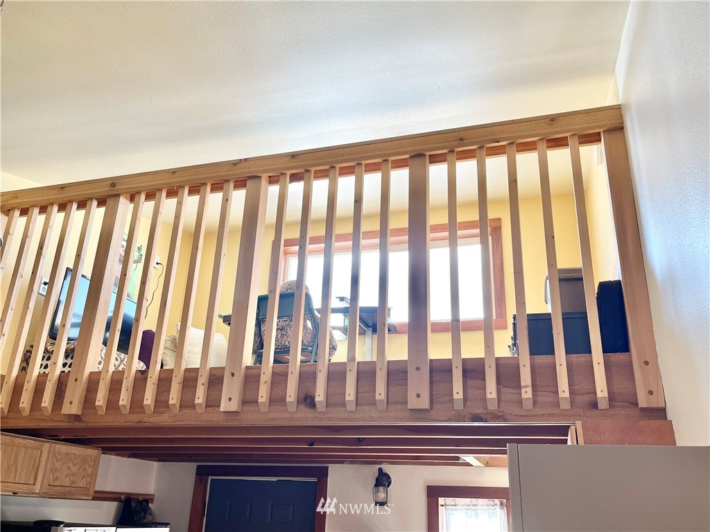 179 Tonasket Airport Road Tonasket, WA 98855 - Photo 10 of 31 a view of staircase with white walls and a window