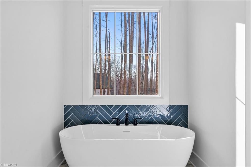 7999 Cokely Court Oak Ridge, NC 27310 - Photo 33 of 49 freestanding tub