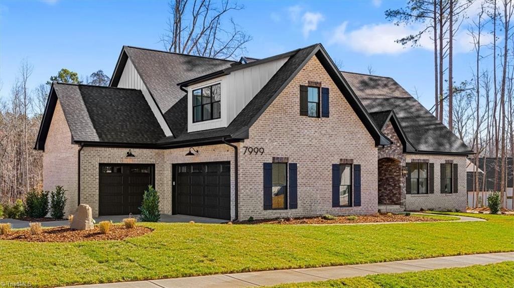 7999 Cokely Court Oak Ridge, NC 27310 - Photo 7 of 49 three car garage