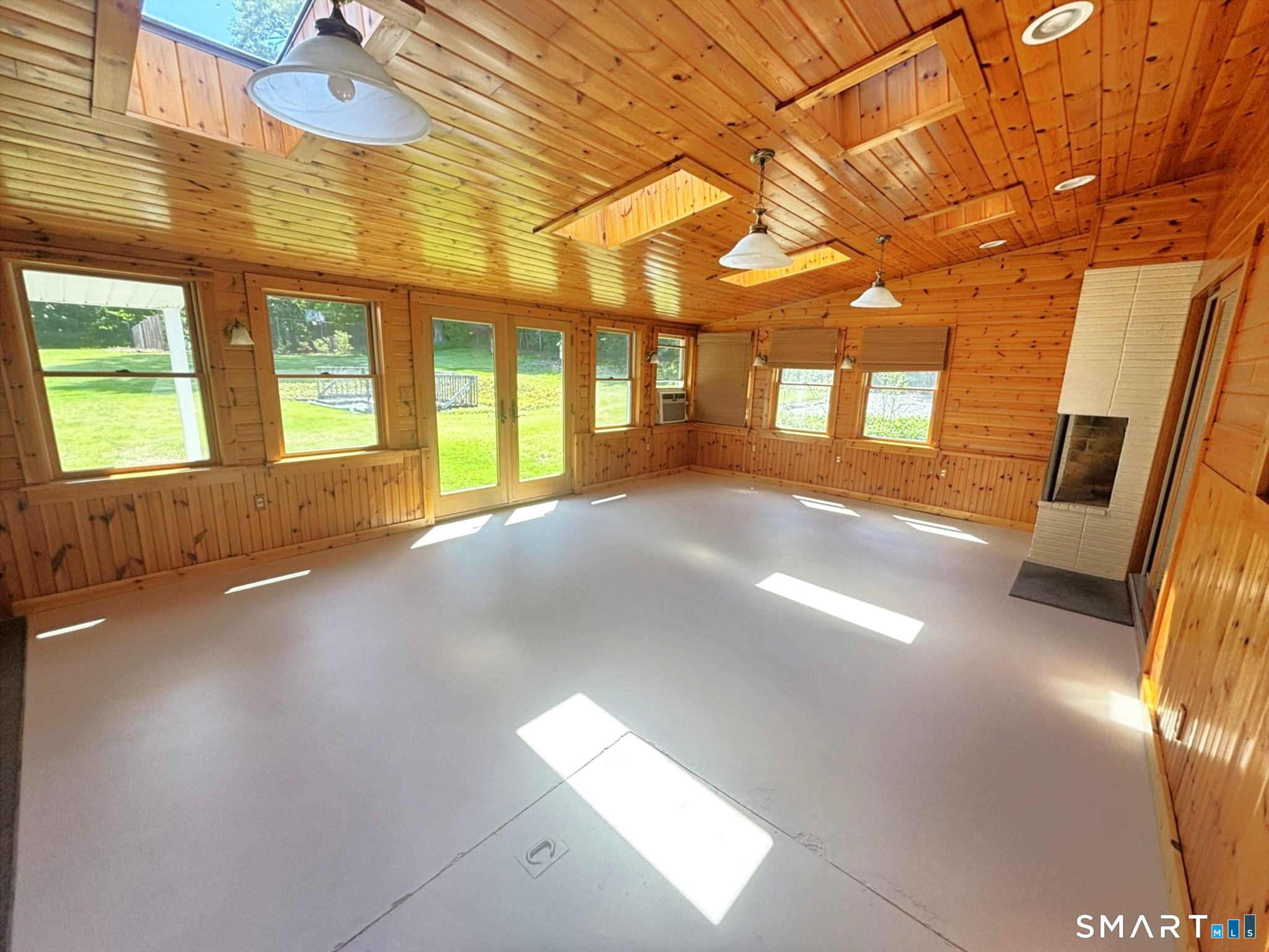 44 Summit Road Prospect, CT 06712 - Photo 8 of 40 a view of an empty room with a fireplace