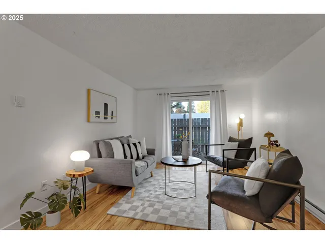 a living room with furniture and a lamp