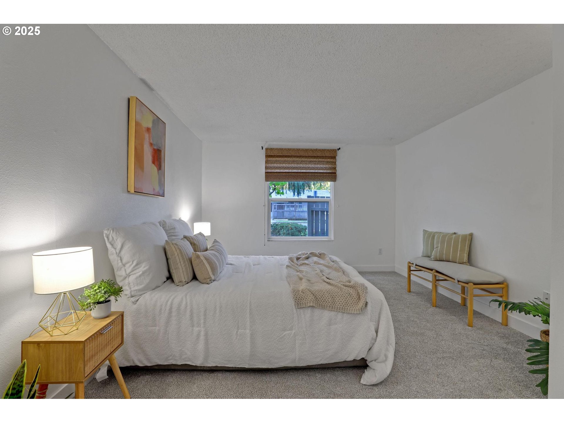 5488 Southwest Alger Avenue, Unit I7 Beaverton, OR 97005 - Photo 10 of 16 a bedroom with a bed and a window