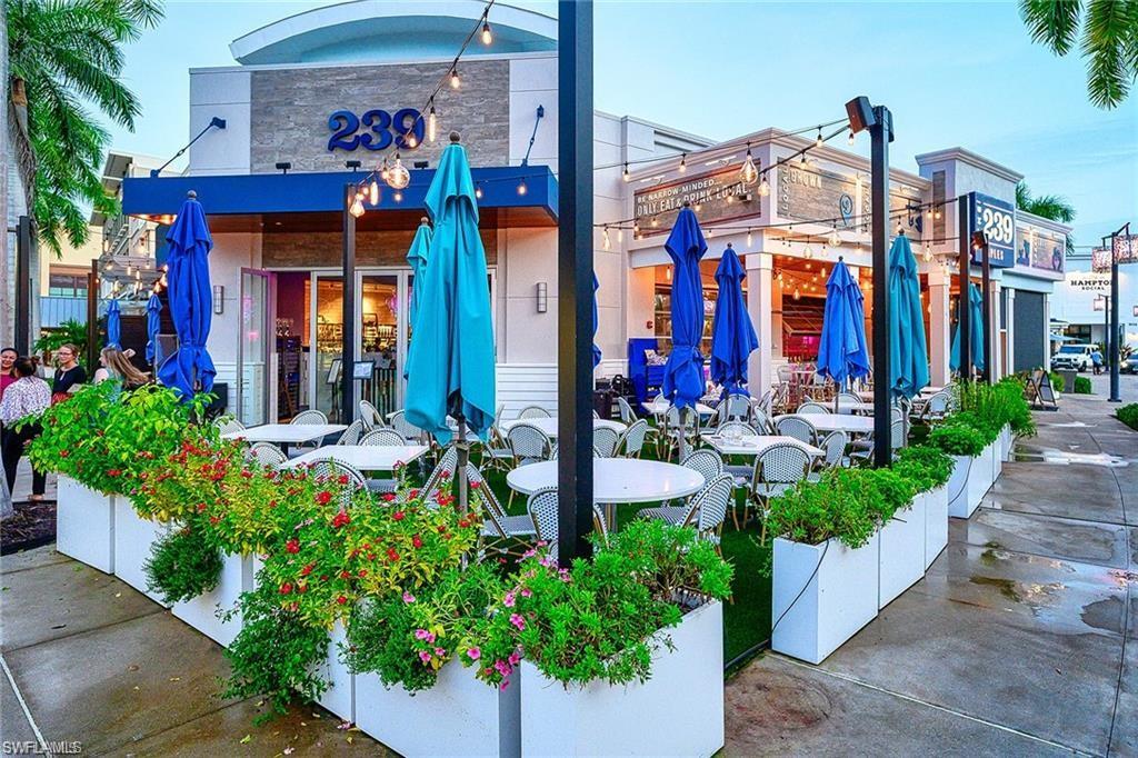 682 95th Avenue North Naples, FL 34108 - Photo 29 of 30 a view of a house with potted plants
