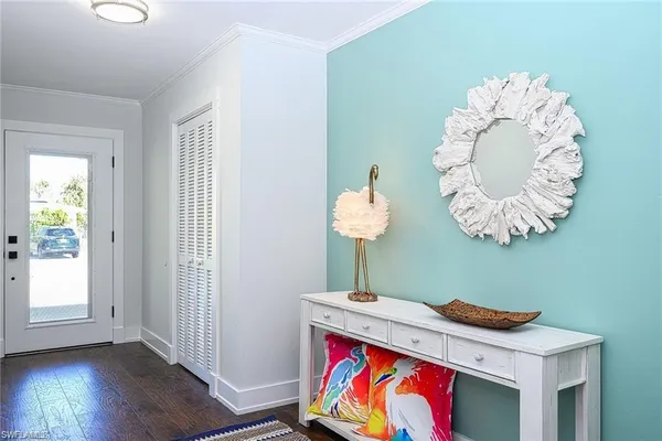 a kitchen with stainless steel appliances granite countertop a refrigerator a stove a sink and a refrigerator