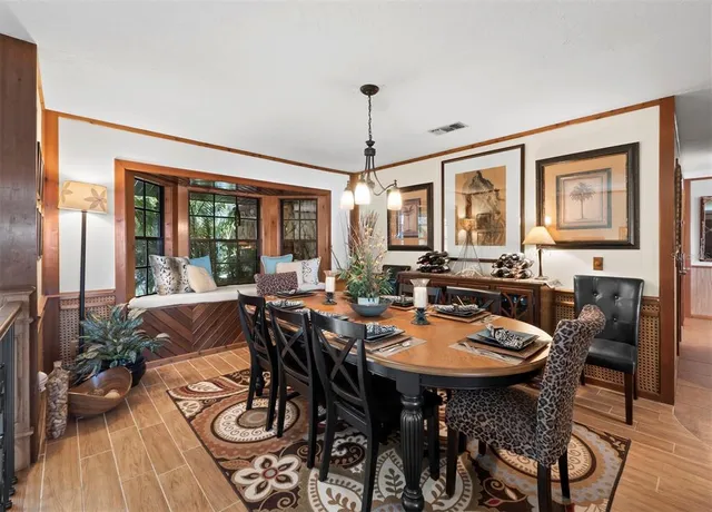 a living room with lots of furniture and appliances