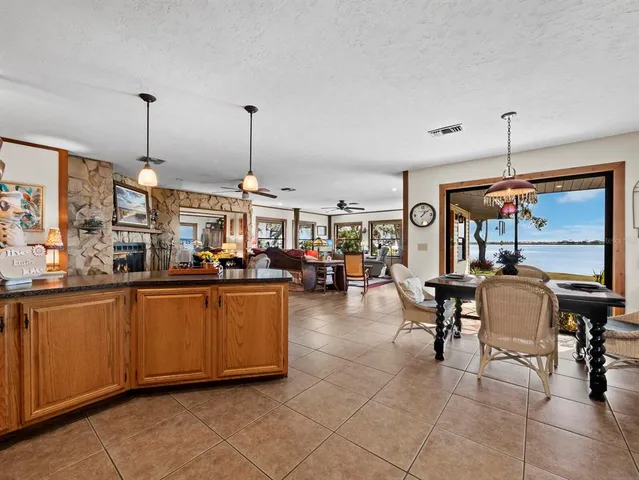 a view of a dining room and livingroom with furniture