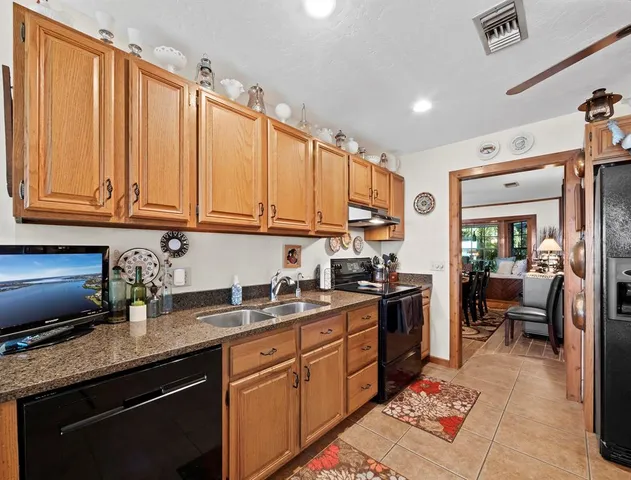 a view of a house with patio outdoor seating