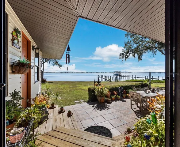 a view of a chairs and table on the terrace