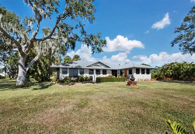a view of a backyard with a garden