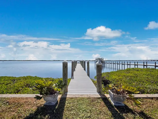 a view of a lake with a yard