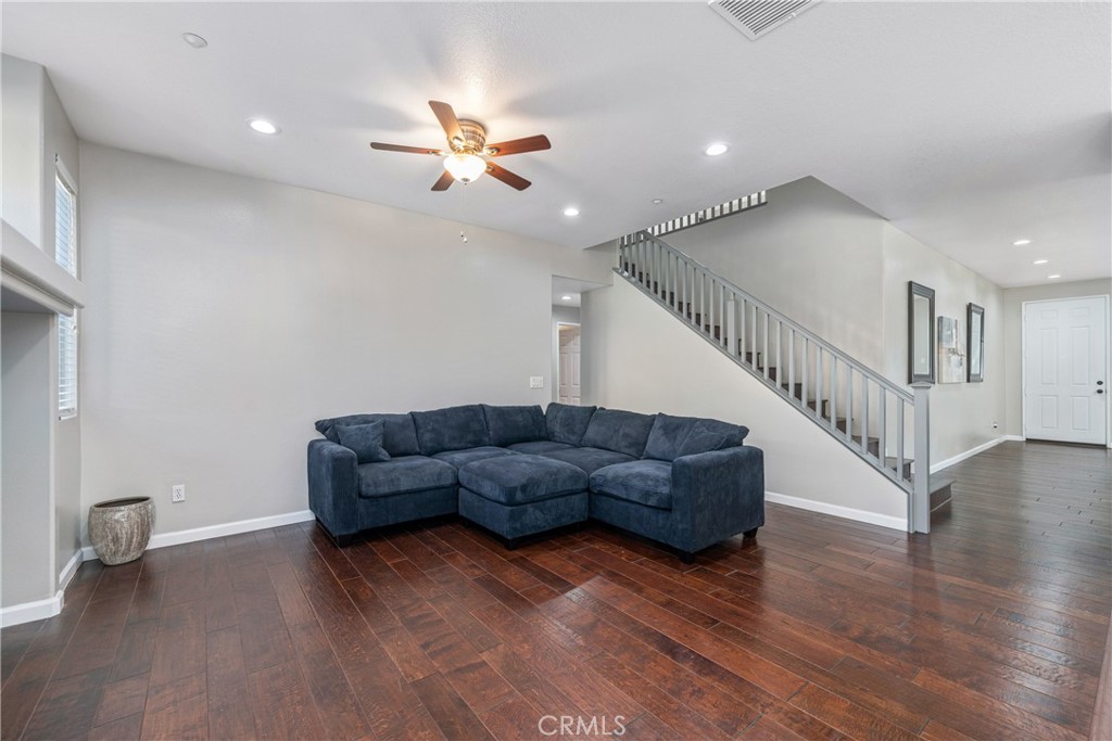 11141 Gardenhurst Court Riverside, CA 92505 - Photo 12 of 65 a living room with furniture and a wooden floor