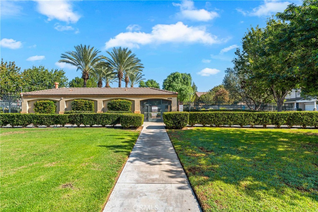 11141 Gardenhurst Court Riverside, CA 92505 - Photo 54 of 65 a front view of a house with garden