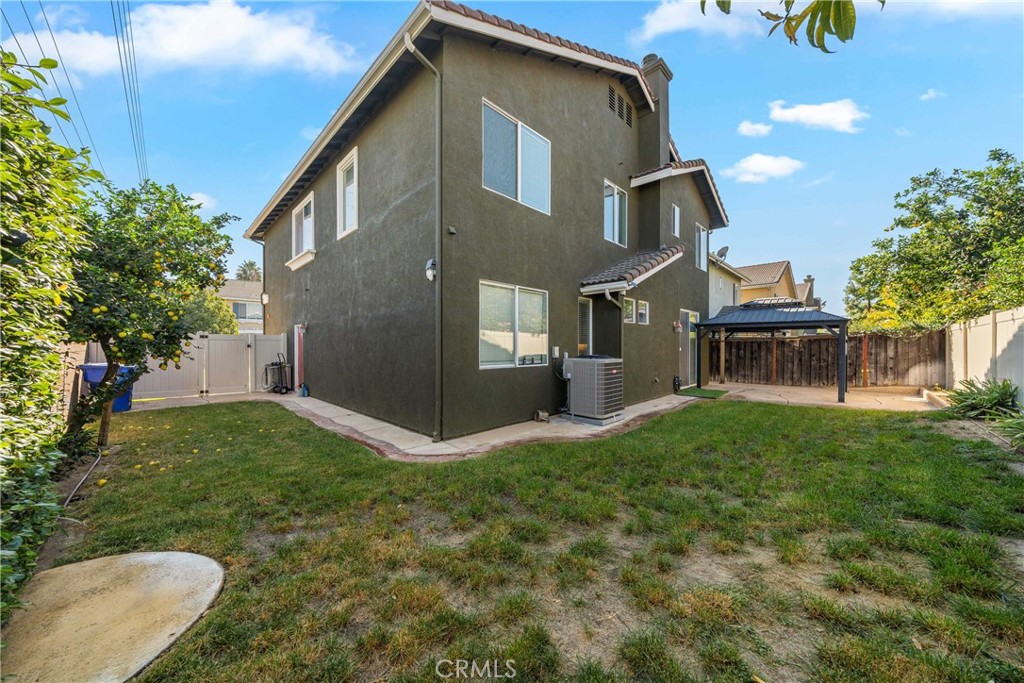 11141 Gardenhurst Court Riverside, CA 92505 - Photo 56 of 65 a view of a house with a yard
