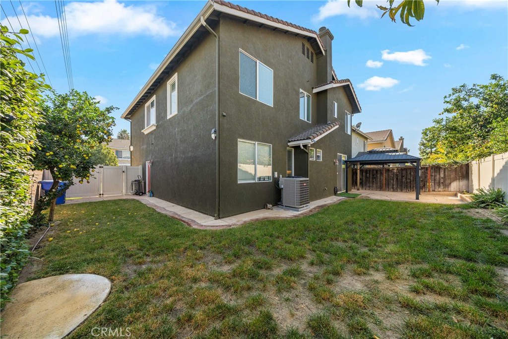 11141 Gardenhurst Court Riverside, CA 92505 - Photo 57 of 65 a view of a house with a yard