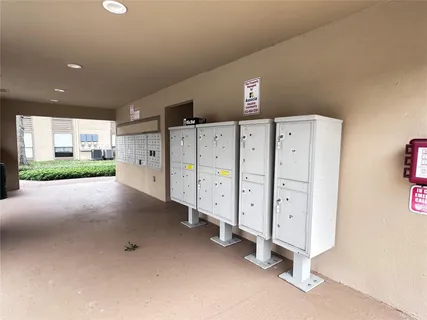 a view of a livingroom with white doors