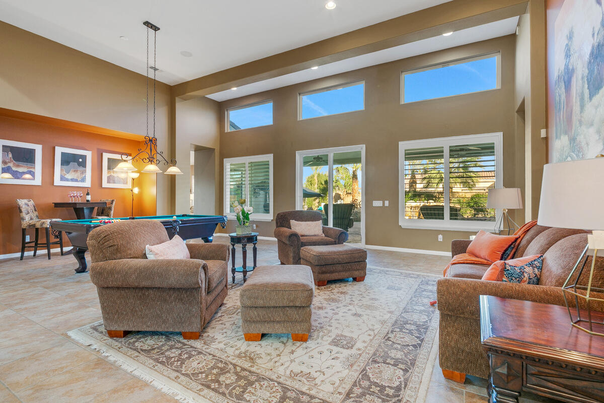 49130 Escalante Street Indio, CA 92201 - Photo 11 of 99 a living room with furniture and a large window