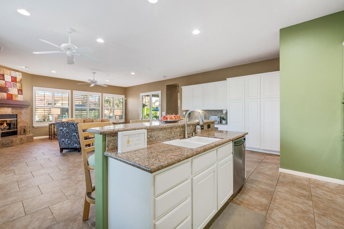 49130 Escalante Street Indio, CA 92201 - Photo 18 of 99 a kitchen with sink and view of living room