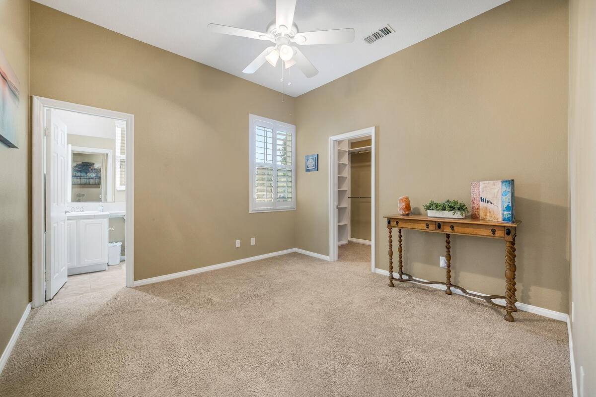 49130 Escalante Street Indio, CA 92201 - Photo 36 of 99 a view of an empty room with window and a kitchen
