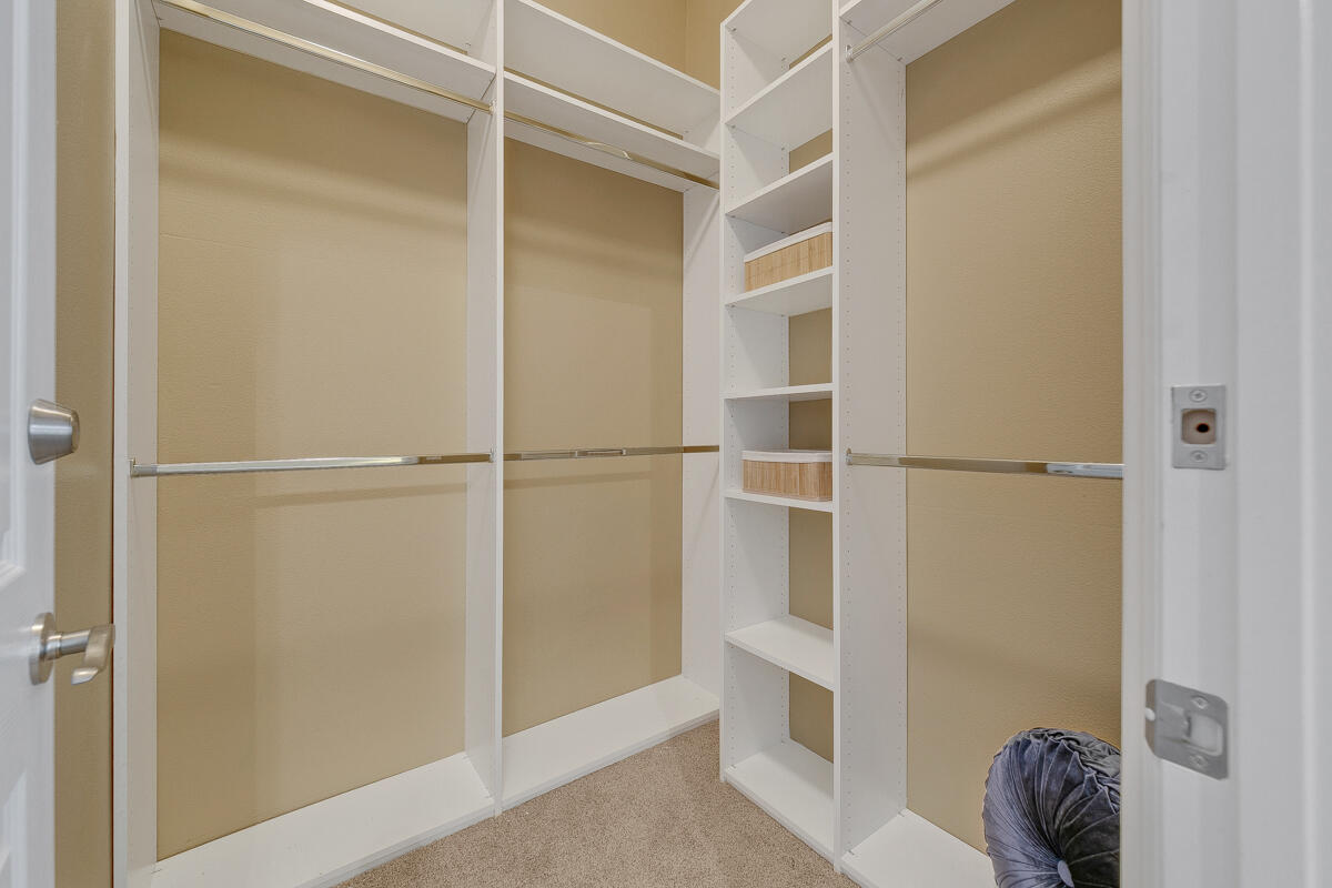 49130 Escalante Street Indio, CA 92201 - Photo 40 of 99 a view of walk in closet with empty racks