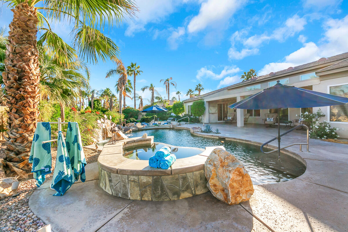 49130 Escalante Street Indio, CA 92201 - Photo 45 of 99 a view of a swimming pool with a patio