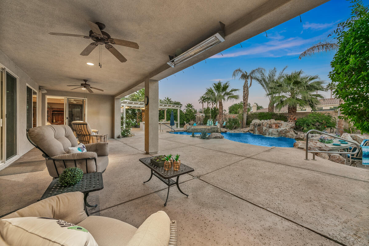49130 Escalante Street Indio, CA 92201 - Photo 69 of 99 a living room with furniture and a potted plant