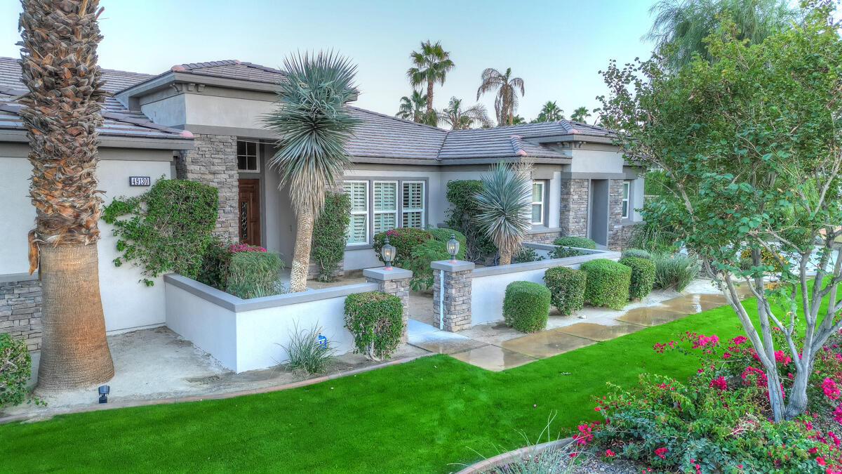 49130 Escalante Street Indio, CA 92201 - Photo 79 of 99 a front view of house with a garden