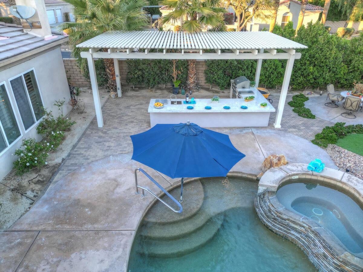 49130 Escalante Street Indio, CA 92201 - Photo 90 of 99 a view of a chairs and table in the patio