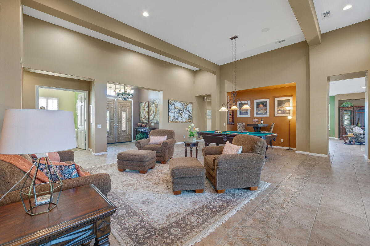 49130 Escalante Street Indio, CA 92201 - Photo 9 of 99 a living room with furniture and wooden floor