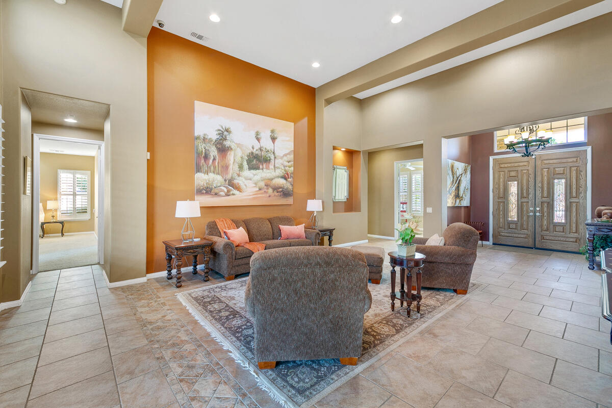 49130 Escalante Street Indio, CA 92201 - Photo 10 of 99 a living room with furniture and a large window