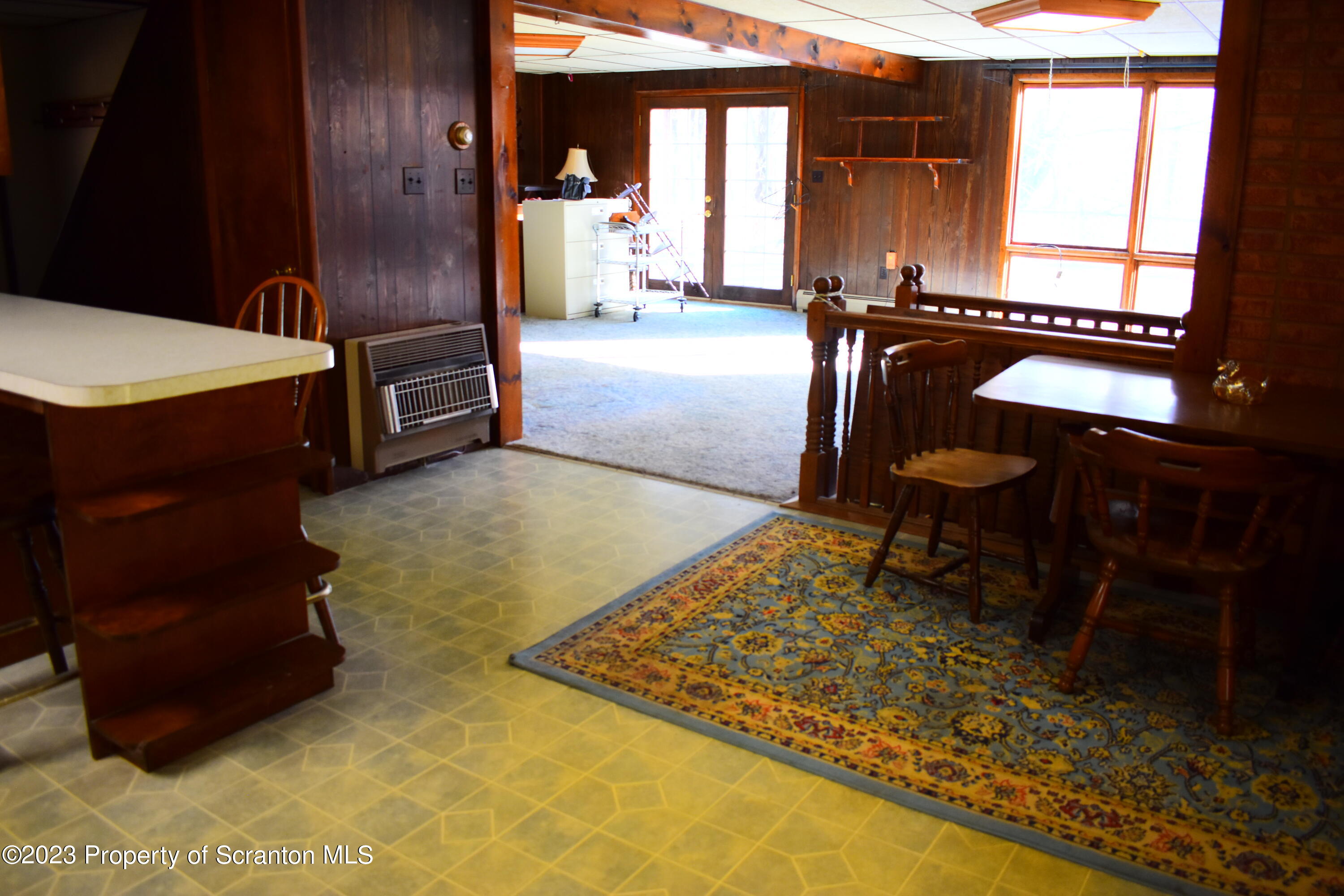 2791 Liberty Park Road Hallstead, PA 18822 - Photo 13 of 41 a living room with a bed furniture and a window