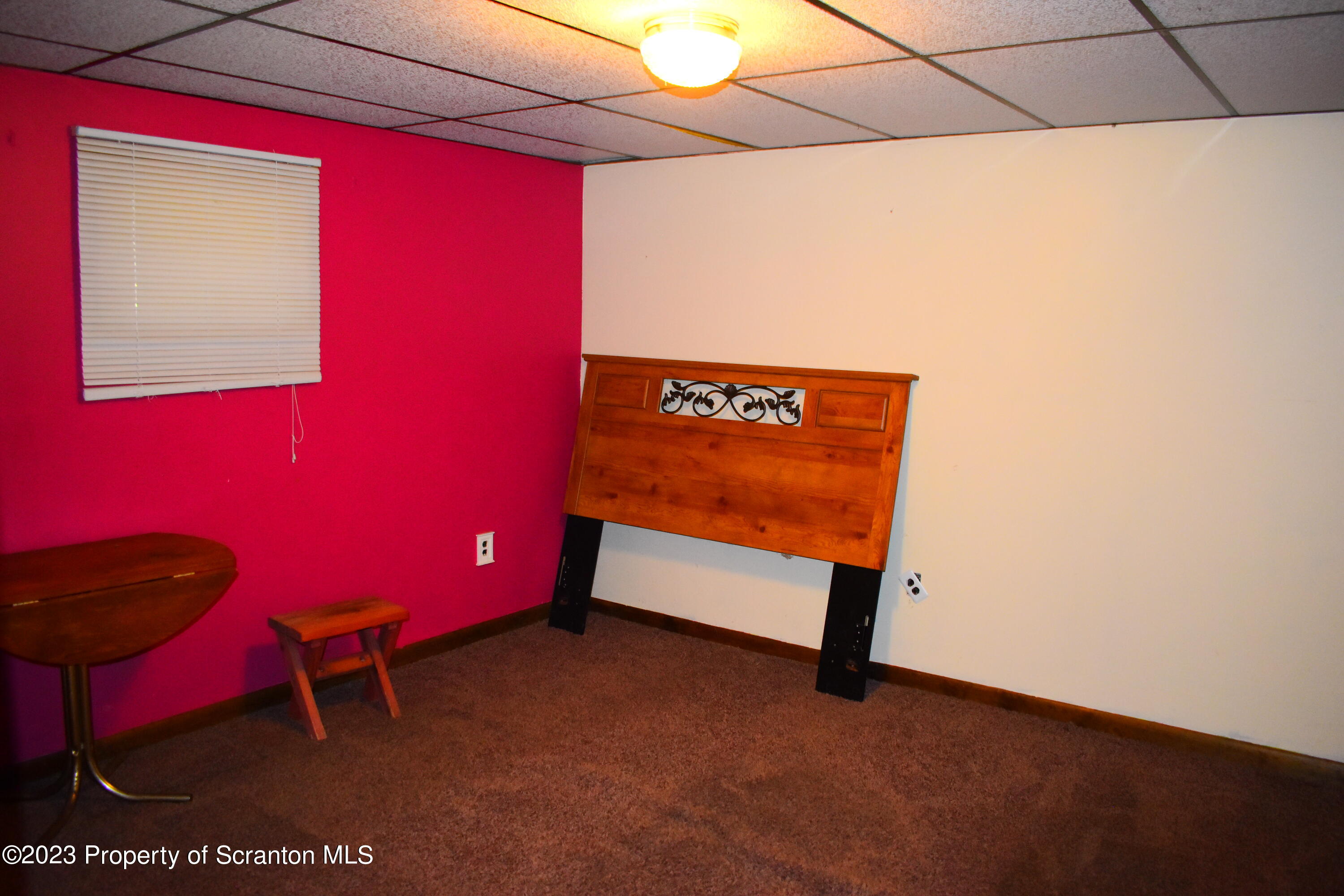 2791 Liberty Park Road Hallstead, PA 18822 - Photo 25 of 41 a bench sitting in a room next to a lamp