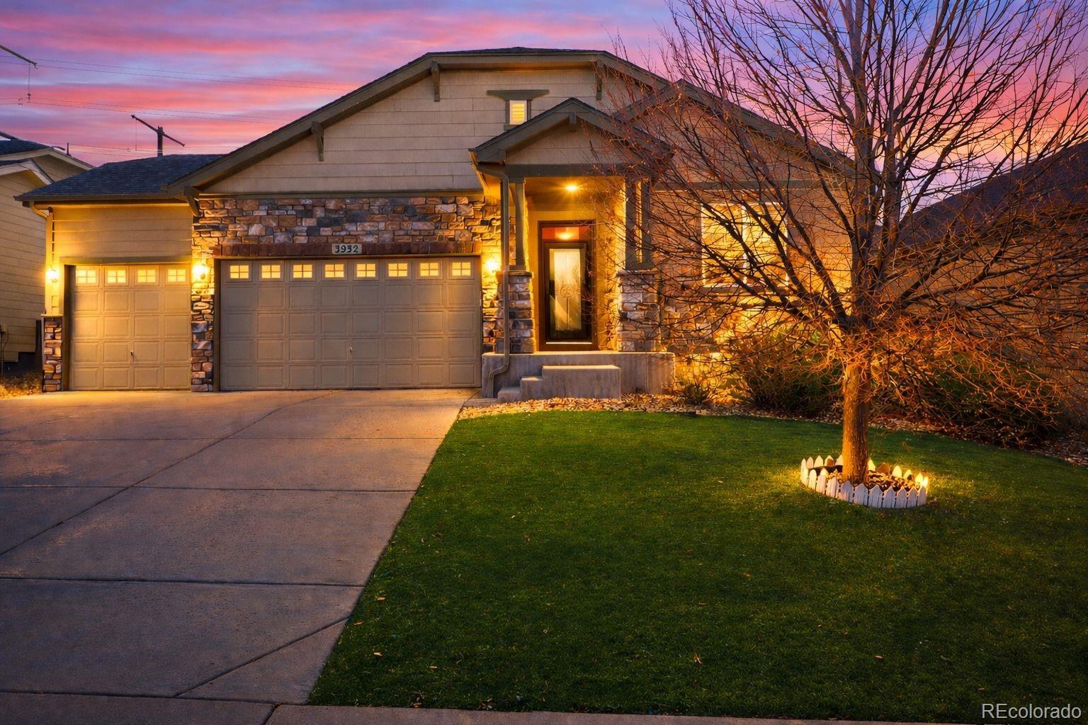 3932 Desert Ridge Circle Castle Rock, CO 80108 - Photo 1 of 49 a front view of a house with a yard
