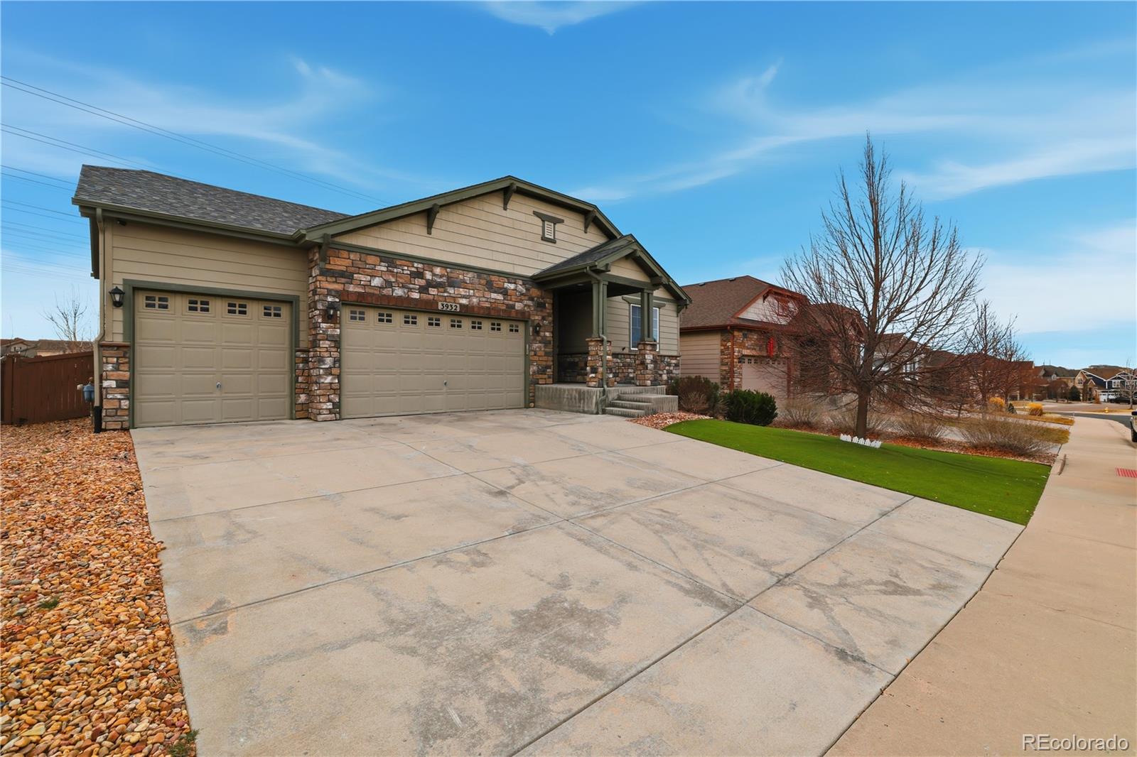3932 Desert Ridge Circle Castle Rock, CO 80108 - Photo 2 of 49 a view of a house with a yard